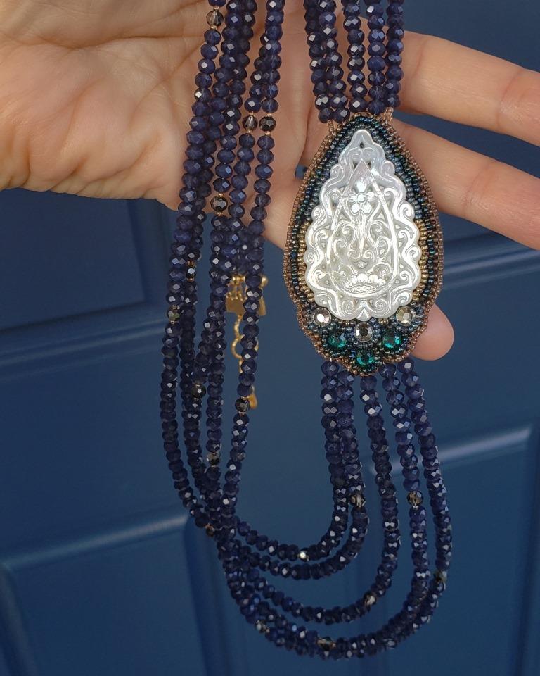 Carved White MOP Necklace w/ 5 strands of Montana Blue Glass Bea